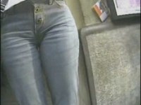 This is the amazing cameltoe video with the pretty babe in tight jeans getting voyeured in the street.