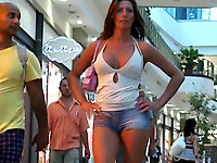 The girl's walk is kinda funny, but she has something to be proud of. For example her big boobies and sporty ass in shorts!